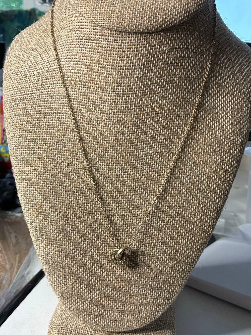 Coach Gold-Tone Interlocking Open Circle Pavé Crystal Pendant Necklace